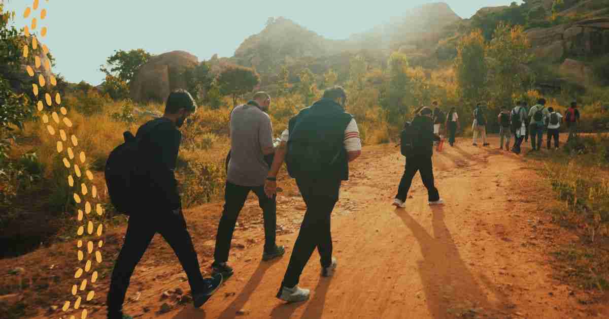 Group hiking on a dirt trail
